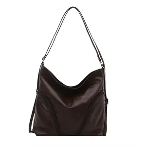 Dark brown leather multi-functional tote backpack with symmetric zippers for daily commute