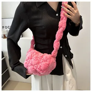 Pink pleated bubble shoulder bag with quilted texture and soft plush fabric for women