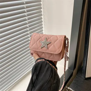 Pink quilted mini square bag with silver star rhinestone accent and chain strap