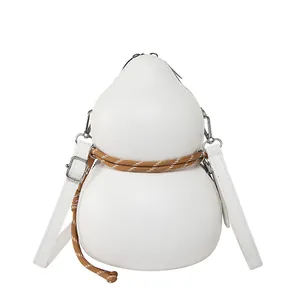 Gourd-shaped white crossbody bag with woven rope detail and adjustable leather shoulder strap