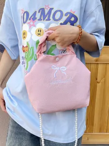Pink fabric handbag with bow embroidery, pearl chain strap and GoodLuck lettering