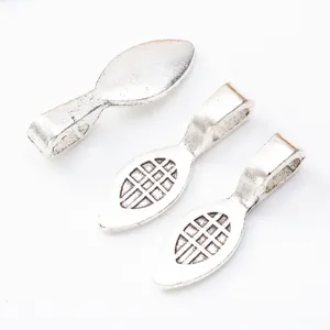 Three antique silver zinc alloy bail clasps for jewelry making on white background