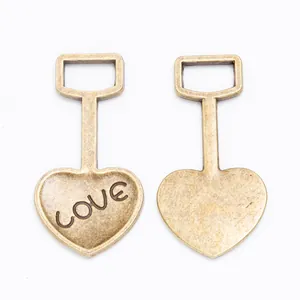 Vintage bronzen hartvormige hangers met LOVE-gravure voor het maken van sieraden