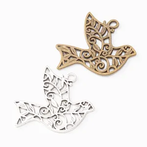 Vintage hollow alloy peace dove bird charms in bronze and silver for DIY jewelry making