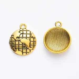 Vintage gold globe pendant charms with detailed continents and map grid lines