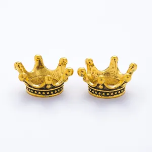 Two vintage gold-finished alloy crown charms for DIY jewelry and handicraft making