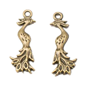 Vintage bronze peacock pendants in zinc alloy with intricate carved feather details
