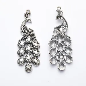 Antique silver peacock pendants made of zinc alloy for DIY jewelry making and crafts