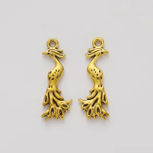 Pair of vintage gold phoenix pendants in zinc alloy for jewelry DIY making projects