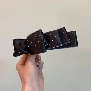 Pince banane élégante en satin à pois avec nœud multicouche pour queue de cheval femme