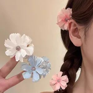 Elegant chiffon flower hair claw clips in white, pink, and blue for summer hairstyles