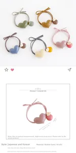 Close-up of heart charm hair ties in five colors with elastic band and acrylic pendants
