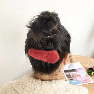 Furry red plush hair clip for women, elegant faux rabbit fur accessory for side hair