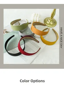 Collection of solid color fabric headbands in black, red, purple, and yellow shades