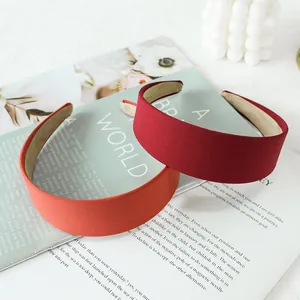 Minimalist wide fabric headband set in burgundy and orange colors with non-slip lining