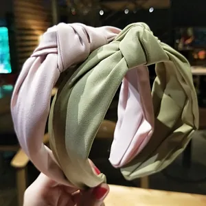 Cerchietti in tessuto con nodo intrecciato rosa antico e verde oliva con trama