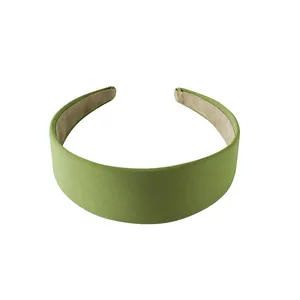 Minimalist wide fabric headband in avocado green with non-slip velvet inner lining