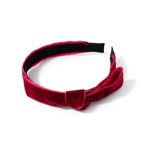 Elegant rose red velvet headband with twist knot design for a vintage French aesthetic