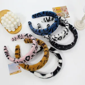 Plush leopard print headbands in assorted candy colors with soft faux fur texture