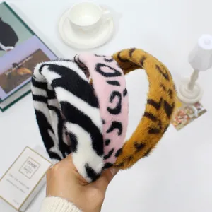 Three-piece set of fuzzy faux fur animal print headbands in leopard and zebra patterns