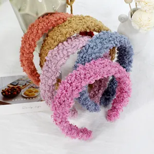 Detail of five-color plush velvet headbands showing soft texture and pastel colors