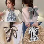 French vintage silk scarf used as hair ribbon, neckerchief, and bag accessory detail