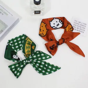 Silk hair scarf set featuring green plaid and cute cat patterns for ponytail hairstyles