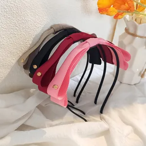 Serre-têtes fins aux couleurs bonbon avec double nœud en beige, noir, rouge et rose