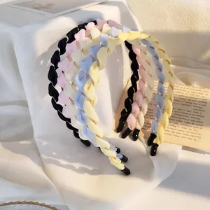 Set di 4 cerchietti intrecciati in colori pastello con punte antiscivolo per acconciature