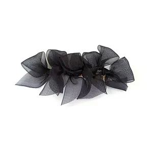 Elegant black lace bow hair clip with layered sheer organza fabric for women's hair styling