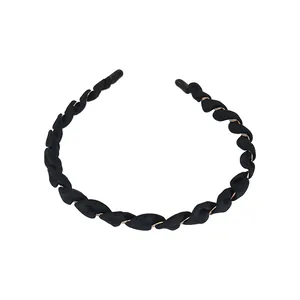 Cerchietto a treccia nero classico in tessuto strutturato con design antiscivolo e confortevole