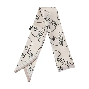 Élégant foulard twilly en satin étroit avec imprimé visage abstrait minimaliste