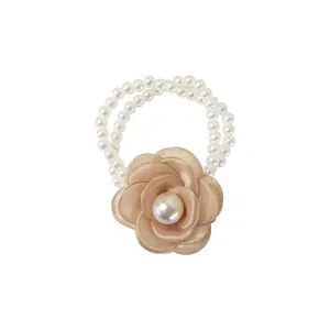 Elegant champagne silk camellia hair tie with double-strand pearl beads for women