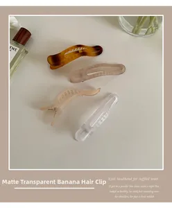 Fermagli a banana opachi in ambra e toni pastello per acconciature eleganti