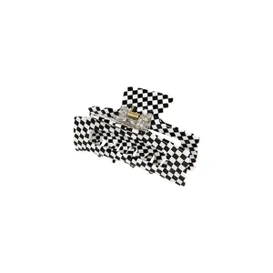 Checkered black and white acetate hair claw clip with strong gold metal spring