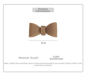 Brown acrylic bow hair accessory detail with 4cm width and handmade craftsmanship