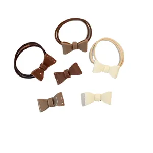 Bow hair ties and clips set in brown and cream acrylic for sweet women hair styling