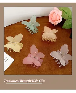 Detalle de cinco pinzas para el cabello de mariposa mate translúcido en tonos pastel