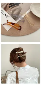 Three-piece set of matte resin banana hair clips in grey, beige, and amber colors