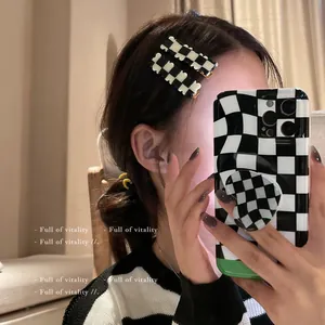 Checkerboard pattern acrylic hair clips with wavy edges for women in minimalist style