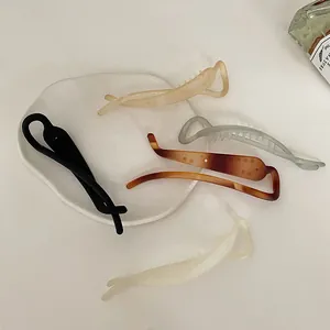 Detailed view of matte non-slip hair clips in five colors with inner teeth for grip