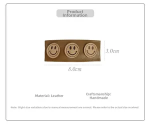 Brown PU leather hair clip with embroidered smile faces, size detail 8.0cm x 3.0cm