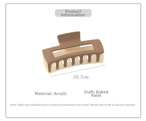 Detail view of 10.5cm matte acrylic hair claw clip in two-tone brown and cream