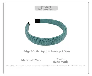 Detail showing the 2.3cm width and woven texture of the light blue knit headband