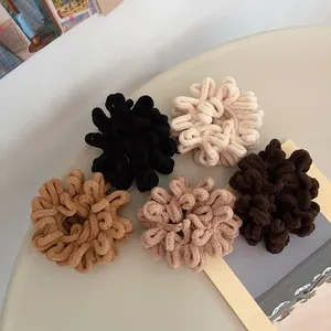 Plush towel hair ties in earth tones featuring thick velvet texture and high elasticity