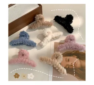 Detail of plush faux fur hair claws in seven assorted autumn and winter colors