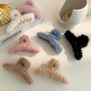 Elegant plush faux fur hair claw clips in various colors for autumn and winter styling