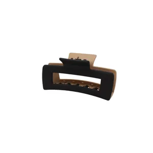 Matte rectangular shark hair clip in charcoal black and beige color blocking
