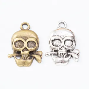 Vintage zinc alloy skull pendants in bronze and silver finishes for DIY jewelry making