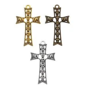 Colgantes de cruz de calavera en aleación de zinc oro, plata y bronce para bisutería
